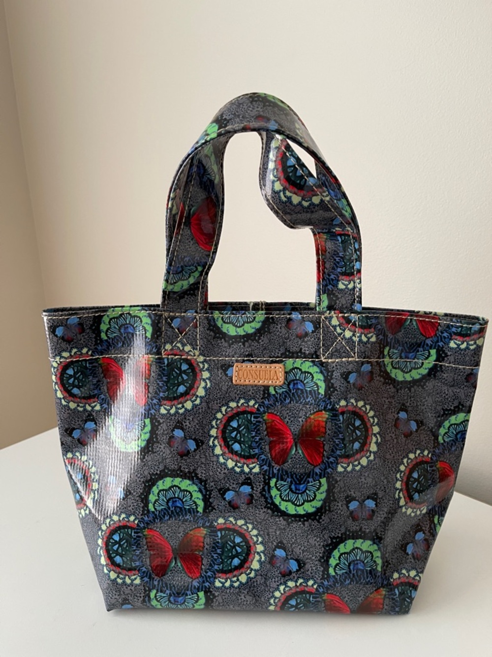 NWOT.. Consuela Mini Glossy Butterfly Tote in Blue, Red and Green